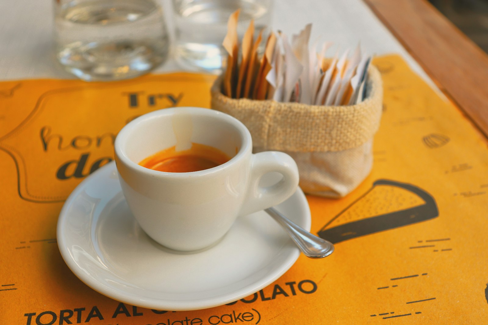 A cup of espresso on a café table