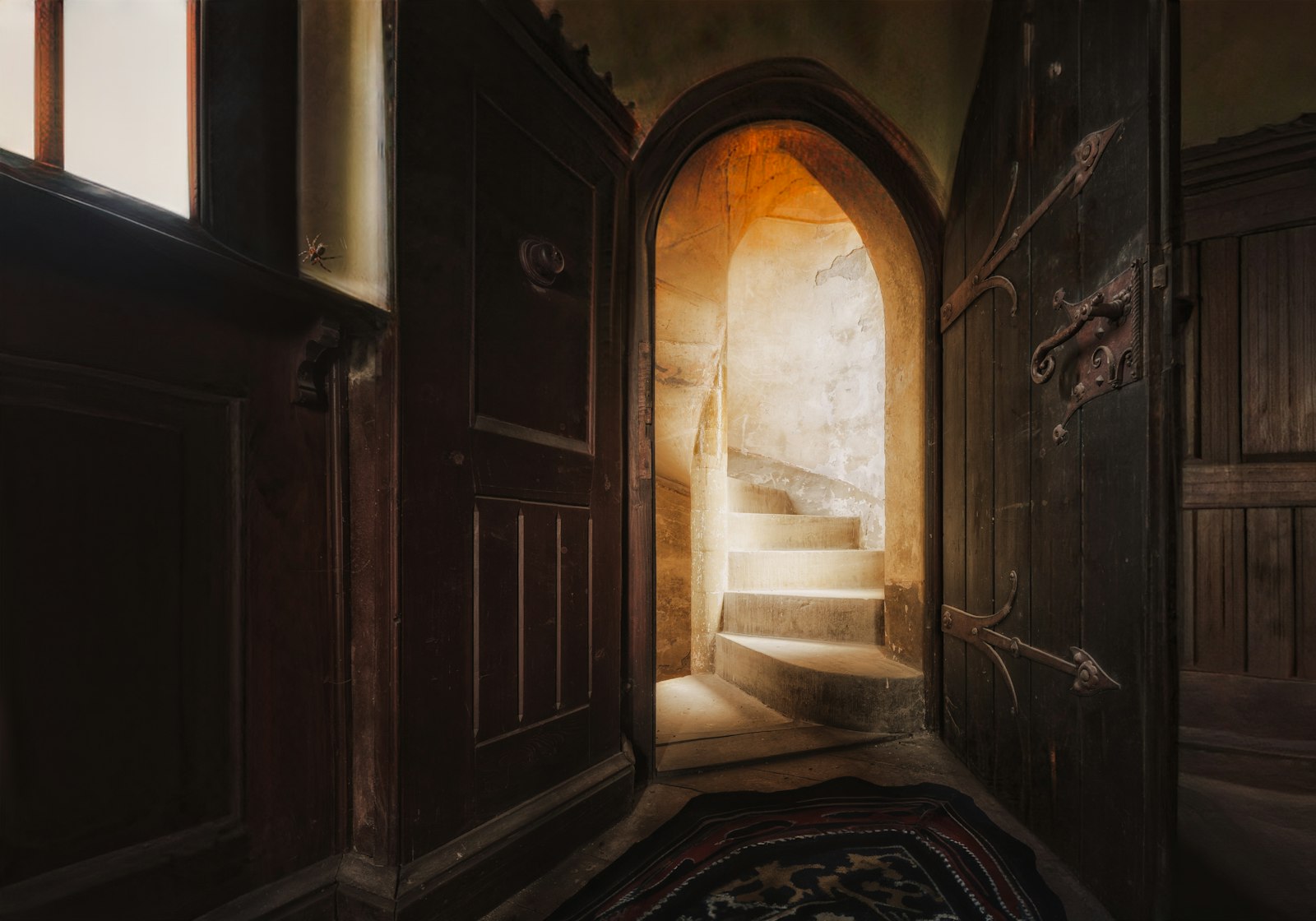 A doorway opening onto a lit stairway