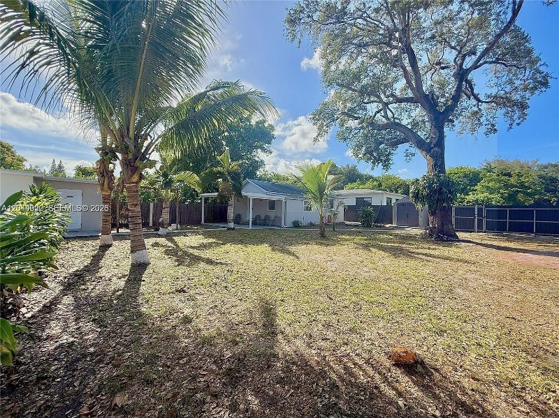 Shade trees and palms at Recover at Monarch, 947 NE 149th St, Miami
