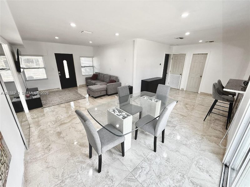 Open living and dining at Recover at Monarch, 947 NE 149th St, Miami