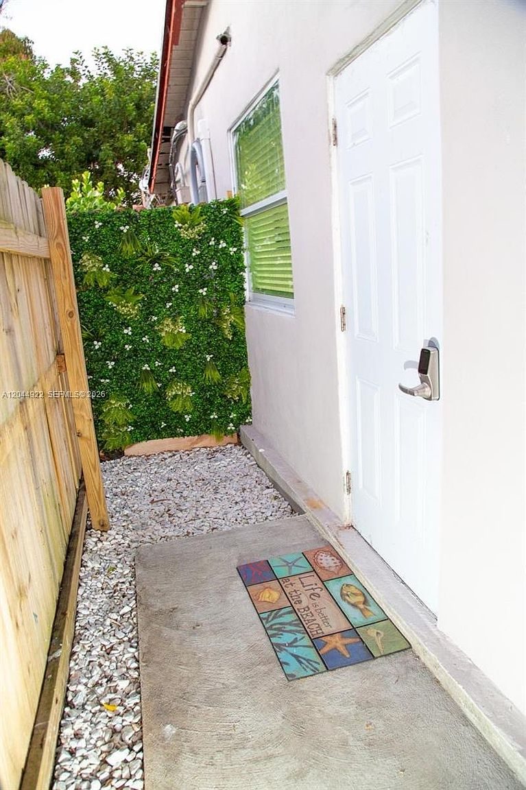Side garden at Recover at Monarch, 947 NE 149th St, Miami